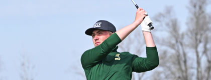 MCC golfer on the course hitting the ball.
