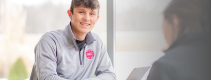 Male college student smiling