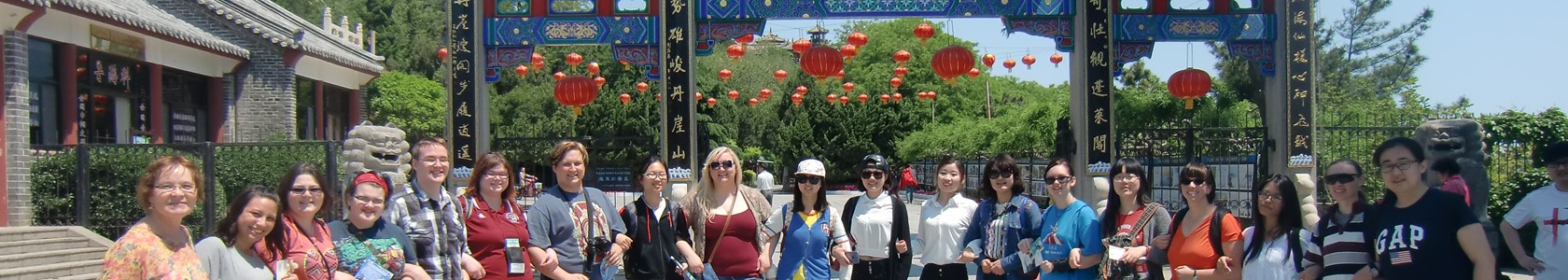 Study abroad students in front of architecture in China.