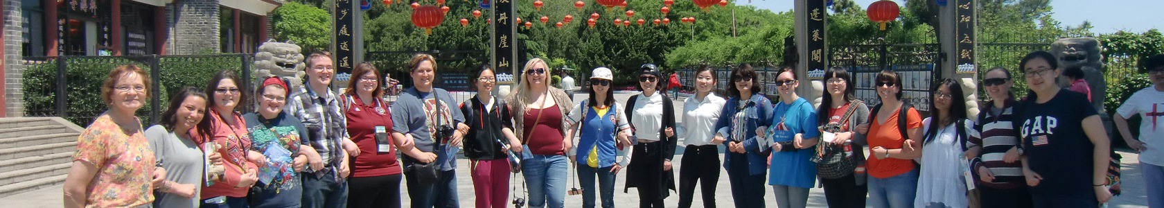 Study abroad students in front of architecture in China.