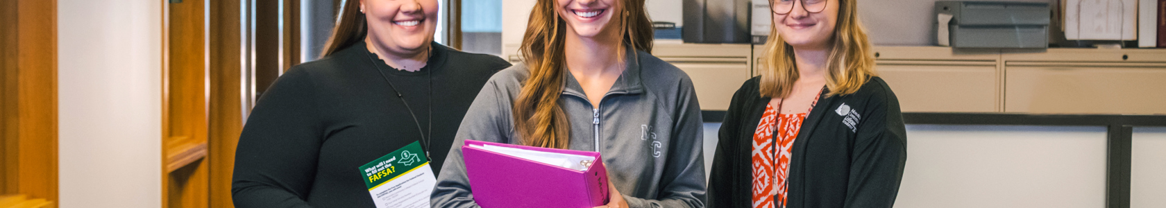 student with financial aid staff.