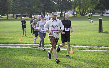 Group of runners on MCC's Sidney campus during the 10th Annual Bramble Ramble race. 
