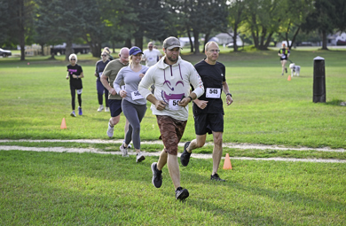 Group of runners on MCC's Sidney campus during the 10th Annual Bramble Ramble race. 