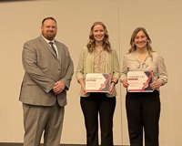 Pictured, from left, are Michigan Farm Bureau State Young Farmer Committee Chair Riley Brazo, Victoria Caine and Lauryn Dailey.