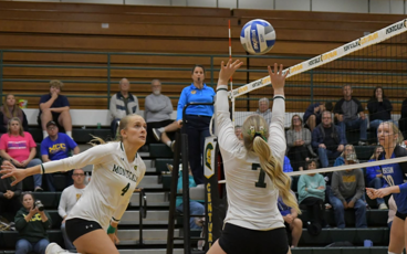 middle hitter going up for spike