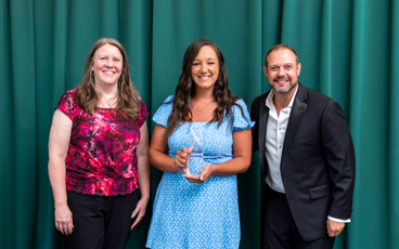 MCCF Executive Director Lisa Lund, MCC alumna Courtney Shafer, and MCC President Bradley Barrick posing for a photo with Courtney's Alumni award.