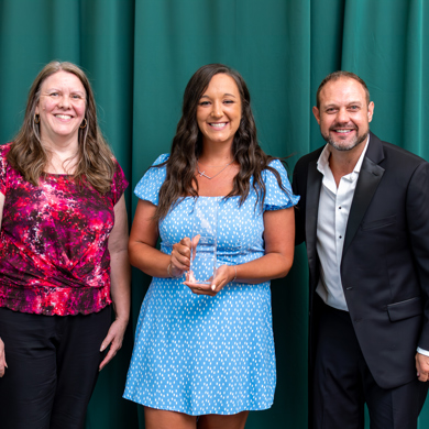 MCCF Executive Director Lisa Lund, MCC alumna Courtney Shafer, and MCC President Bradley Barrick posing for a photo with Courtney's Alumni award.