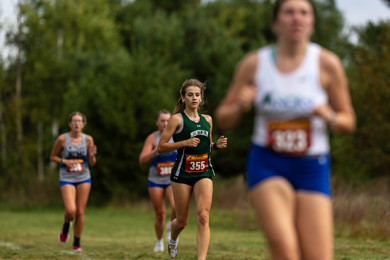 MCC women's cross country runner Karly Fisk running during a race. 