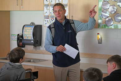Educators Cooperative CEO Steve Regur gives a brief classroom lesson to Hailey Doornbos’ fourth-grade class at Central Montcalm Upper Elementary during a recent visit. 